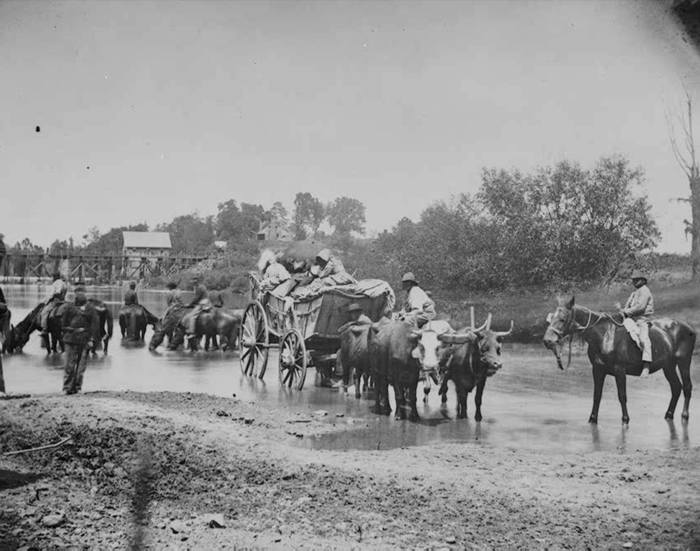 Fugitive African Americans Fording the Rappahannock River. Rappahannock, Virginia, August 1862
