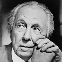 'Architect Frank Lloyd Wright, head-and-shoulders portrait, facing left'