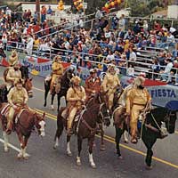 Photo of people riding horses in the parade