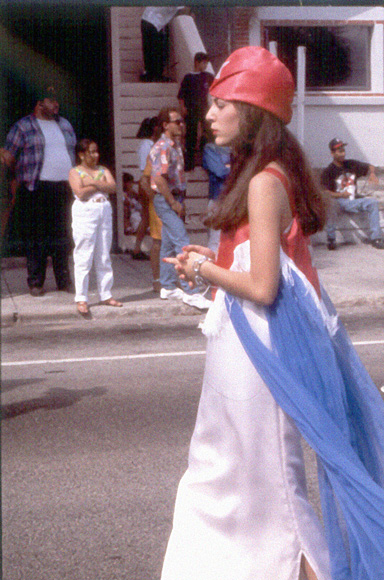 Photo of woman walking in street