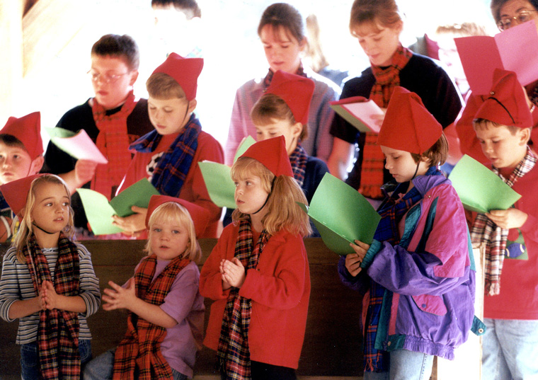 Photo of youth choir performing in costume