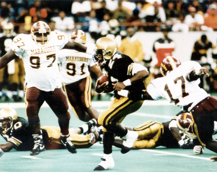 Photo of Central State and Alabama State football players on the field