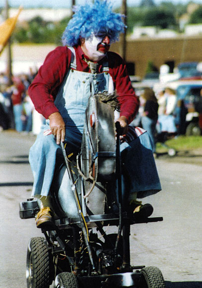 Photo of 'Smilin' Joe' on a mechanical horse