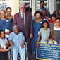 Photo of Northup descendants with Saratoga Springs Mayor O'Connell