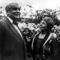 Pres. Warren G. Harding with his wife in garden