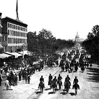 Artillery unit passing on Pennsylvania Avenue near the Treasury, 1865