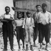 Six black workers in the Alexandria (Va.) Glass Factory, 1911