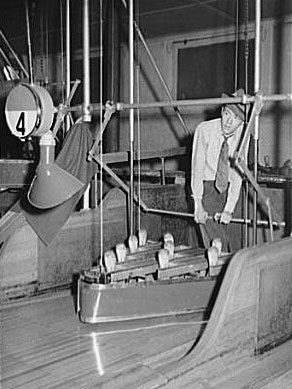 Pin boy in bowling alley