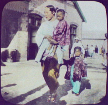 Mother and Children on Street, Tientsin, China.