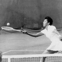 Photo of Althea Gibson Playing Tennis