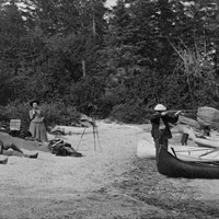 Picnic along shore of lake, near mouth of Socateau River