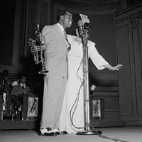 Portrait of Louis Armstrong and Velma Middleton, Carnegie Hall, 1947.