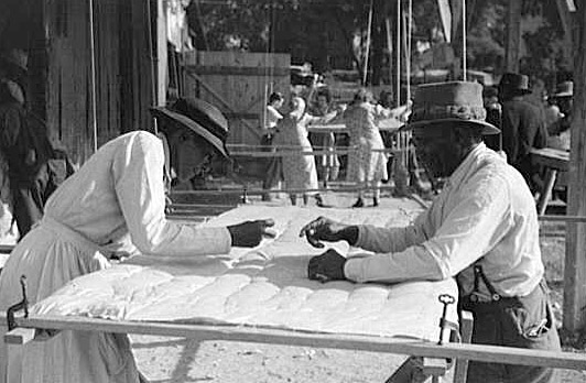 Making a Quilt from Surplus Commodity Cotton, 1941.