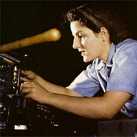 Mary Louise Stepan, 21, used to be a waitress. She has a brother in the air corps.