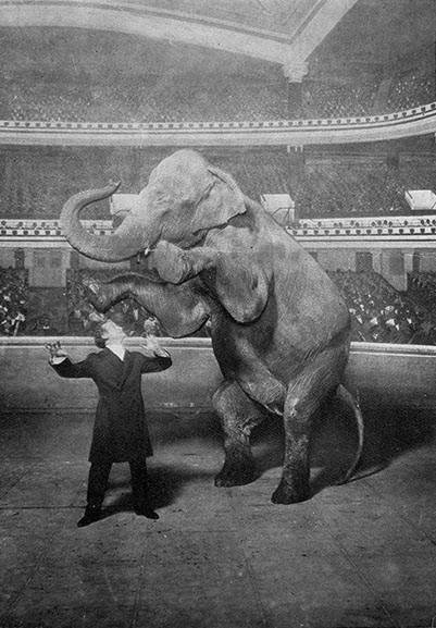 Houdini and Jennie, the elephant, performing at the Hippodrome, New York