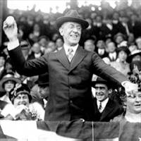 President Woodrow Wilson throwing out the first ball, opening day, 1916.