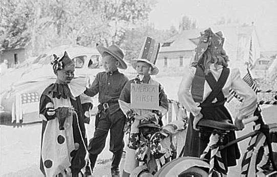Bicycle riders in parade on the Fourth of July at Vale, Oregon, 1941.