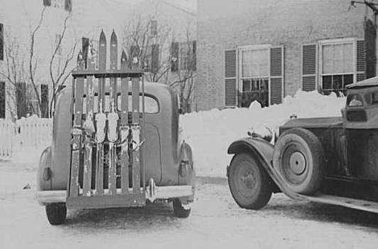 Car with skiis on ski rack, ready to hit the slopes, Vermont