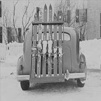 Car with skiis on ski rack, ready to hit the slopes, Vermont