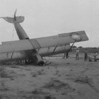 Biplane crash.