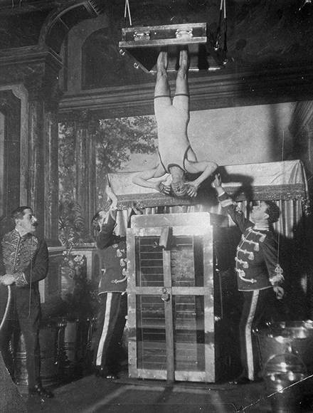 Houdini and the water torture cell, 1913.