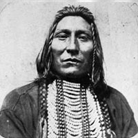 Black and white headshot of a Native American man 