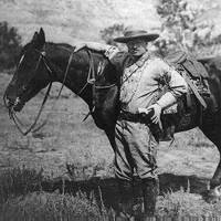 Theodore Roosevelt wearing cowboy outfit, 1910.