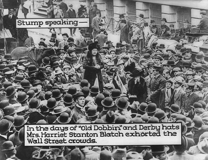 Harriot Stanton Blatch speaking to large crowd of men, Wall Street, New York City.