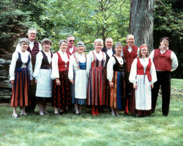 Photo of FinnConn folk dancers standing in costume, 1992