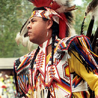 Photo of a Comanche preparing for dance competition