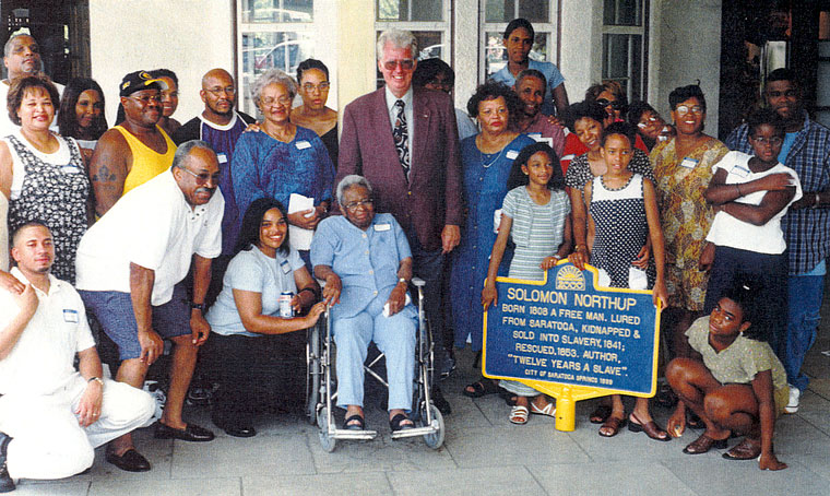 Photo of Northup descendants with Saratoga Springs Mayor O'Connell