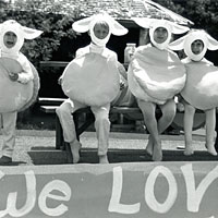 Photo of four children performing in lamb costumes