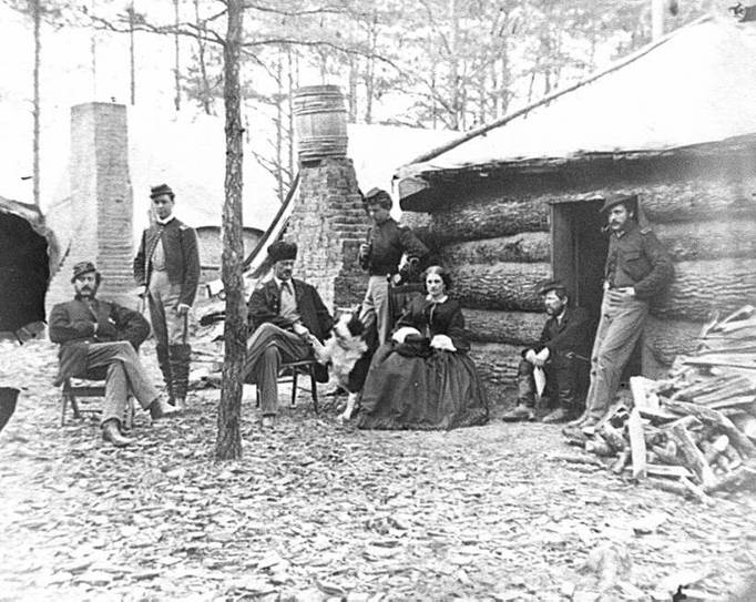 Brandy Station, Va. Officers and a lady at headquarters of 1st Brigade, Horse Artillery, 1864.