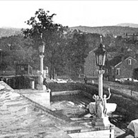 Steps of the Capitol with covered guns