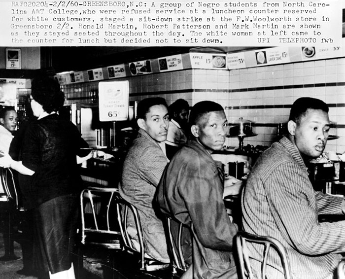 Ronald Martin, Robert Patterson, and Mark Martin stage sit-down strike after being refused service at an F.W. Woolworth luncheon counter, Greensboro, N.C.