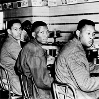 Ronald Martin, Robert Patterson, and Mark Martin stage sit-down strike after being refused service at an F.W. Woolworth luncheon counter, Greensboro, N.C.